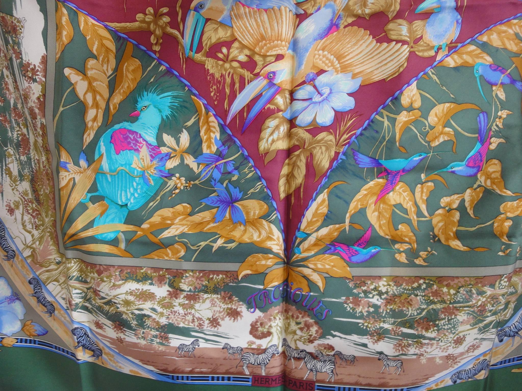 Vintage HERMES Carre large silk scarf with bird, zebra, and giraffe print in green, wine, blue, pink, multicolor. Classic foulard. 

This is a 100% twill, large size silk Carre scarf from HERMES in the 90s. 
It's a perfect beauty with the print