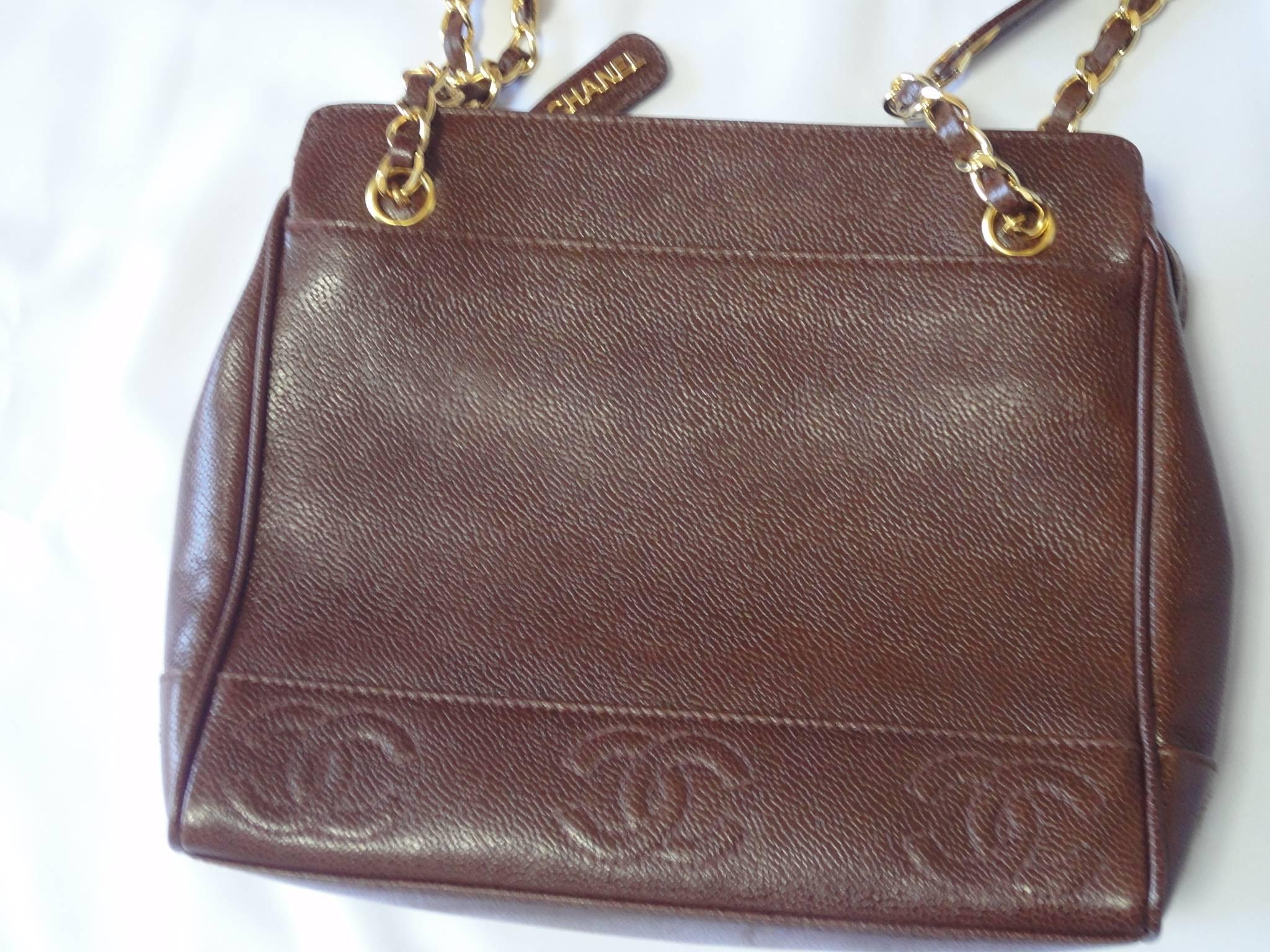 MINT. Vintage CHANEL dark brown caviar leather shoulder bag, tote with CC stitch marks and gold-tone chain and straps. Perfect daily use bag.

MINT, beautiful condition!! Just like NEW!

This is a vintage caviar leather chain shoulder tote bag in