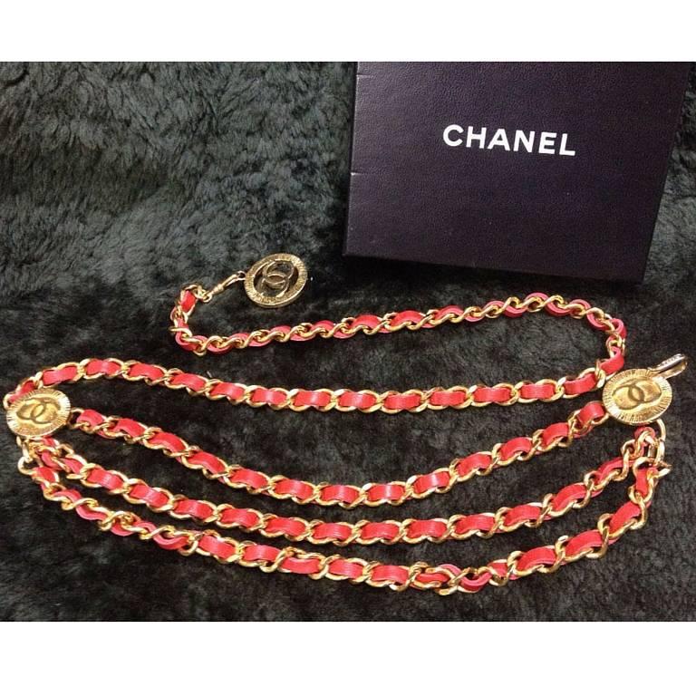Mint. 80's Vintage CHANEL red leather chain belt with golden CC charms. Must-have belt from CHANEL. Also as necklace

Here is another fabulous piece from CHANEL back in the era of 80's with a stamp 1984.
Introducing a triple layer red leather