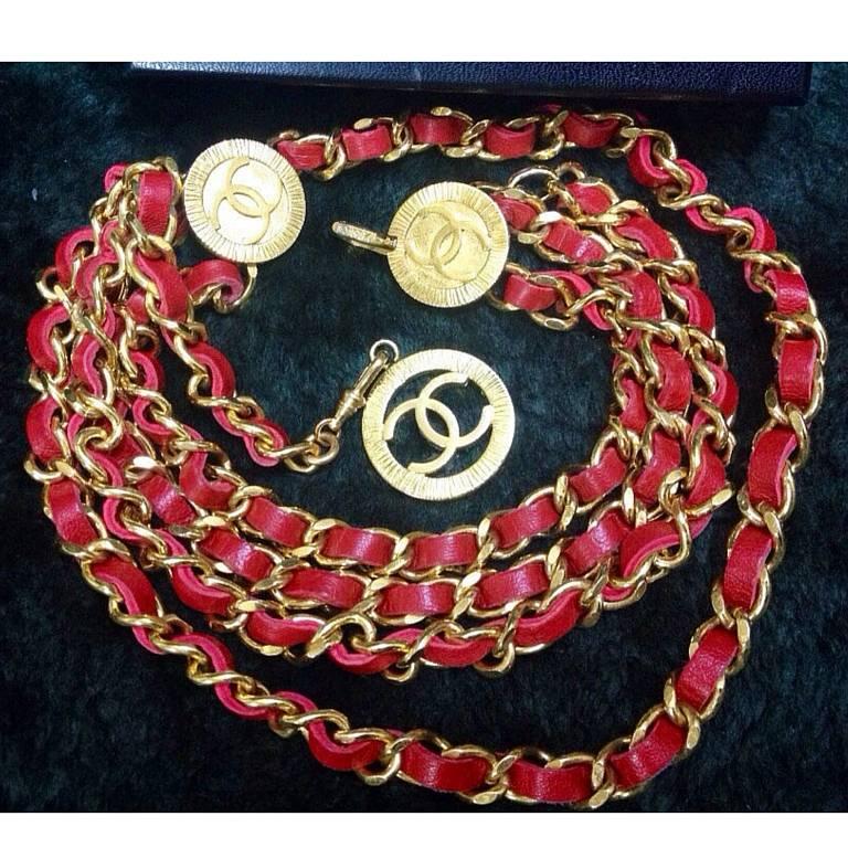 Brown Mint. 80's Vintage CHANEL red leather chain belt with golden CC charms. 