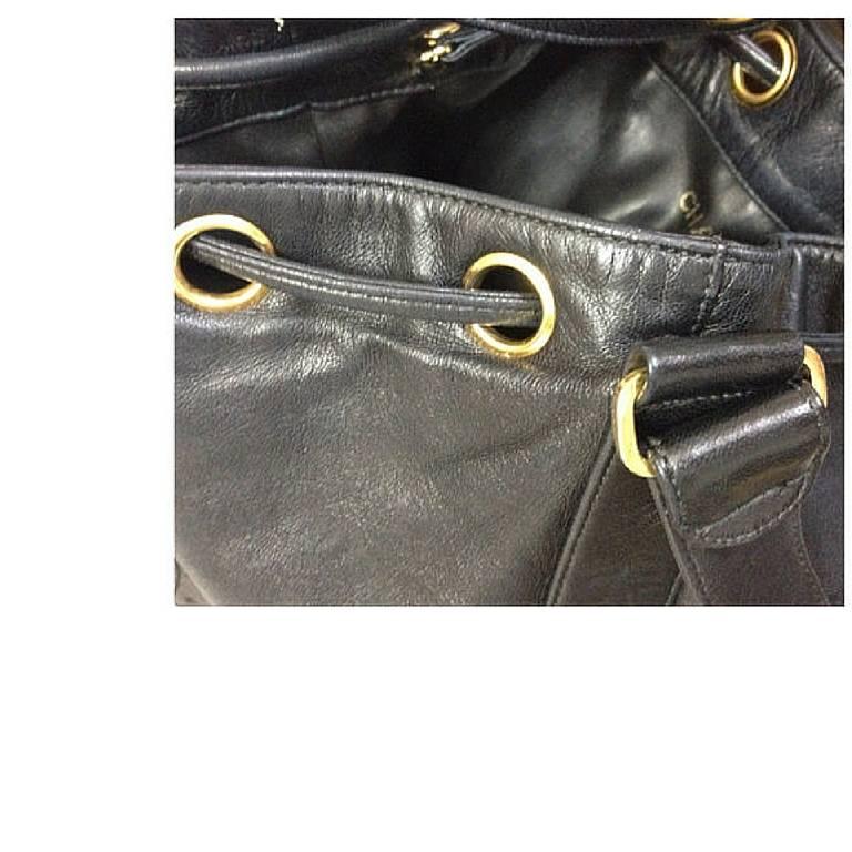 Vintage CHANEL black lamb leather hobo bucket shoulder bag with drawstrings For Sale 3