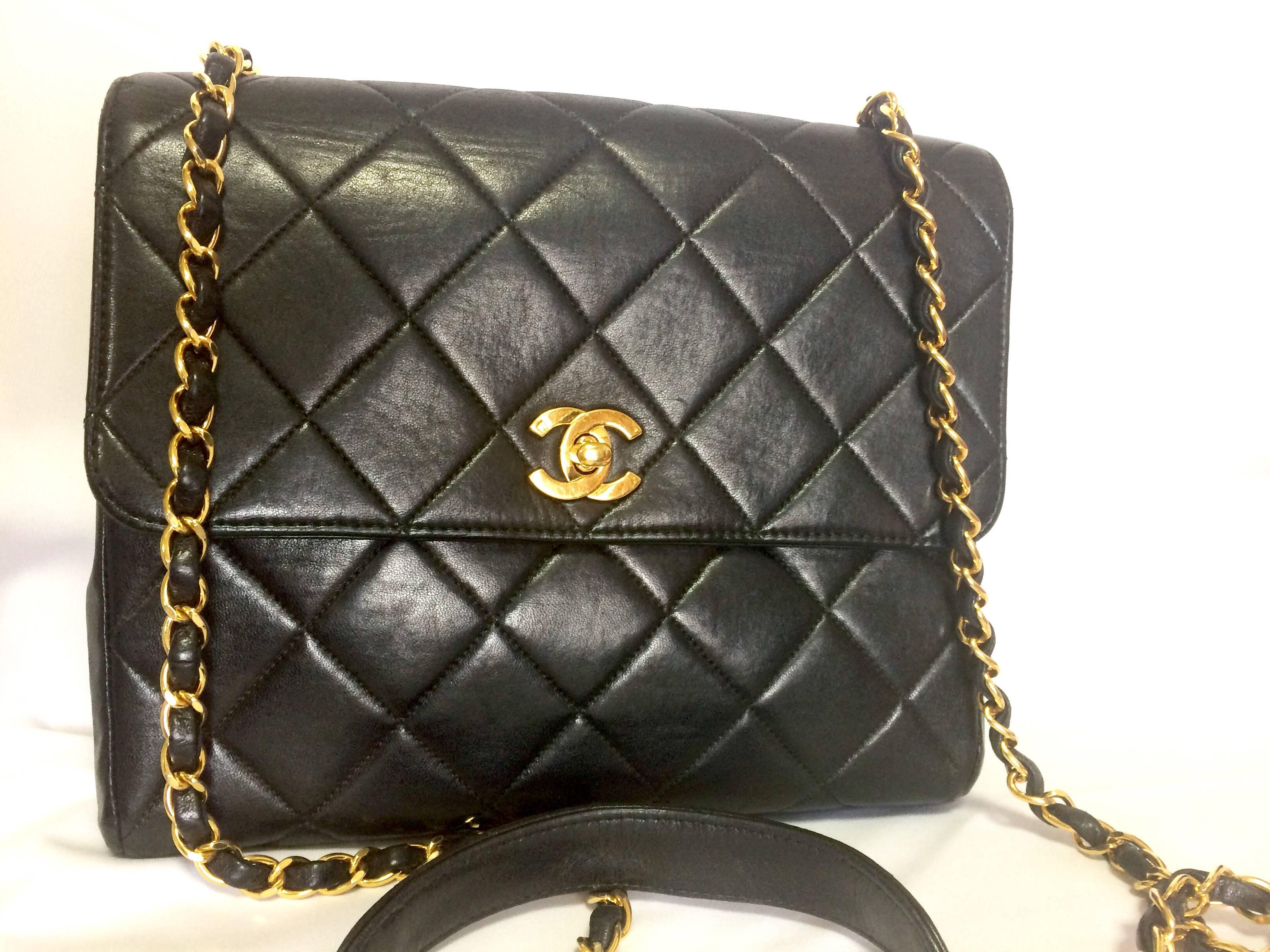 Vintage CHANEL black lamb leather 2.55 classic square shape shoulder bag with golden CC and chain strap. Elegant purse.

Introducing a vintage black lambskin 2.55 classic square shape bag from CHANEL back in the 90's era. 
Classic and popular