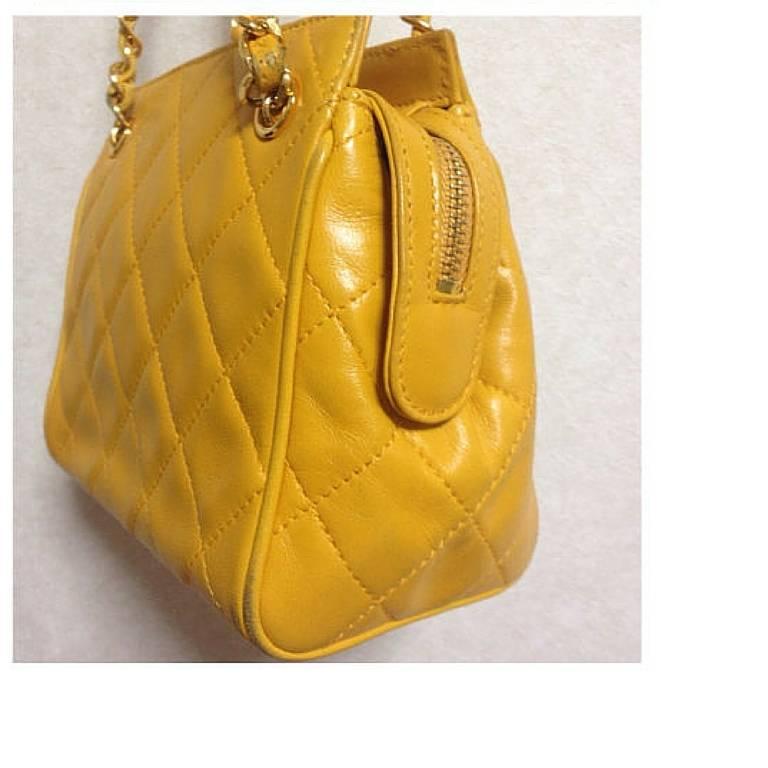 Orange Vintage CHANEL lucky yellow color, lambskin classic chain mini shoulder bag. For Sale