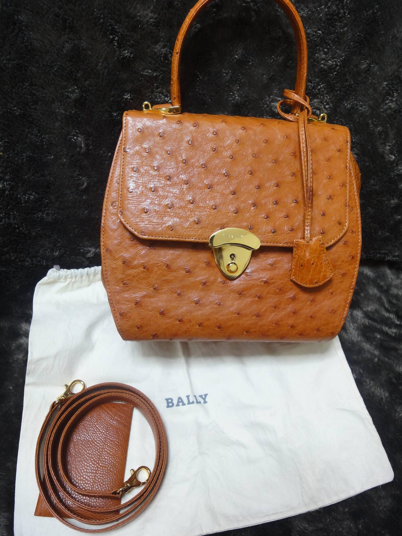 Women's MINT. Vintage BALLY genuine ostrich leather orange brown handbag with strap. For Sale