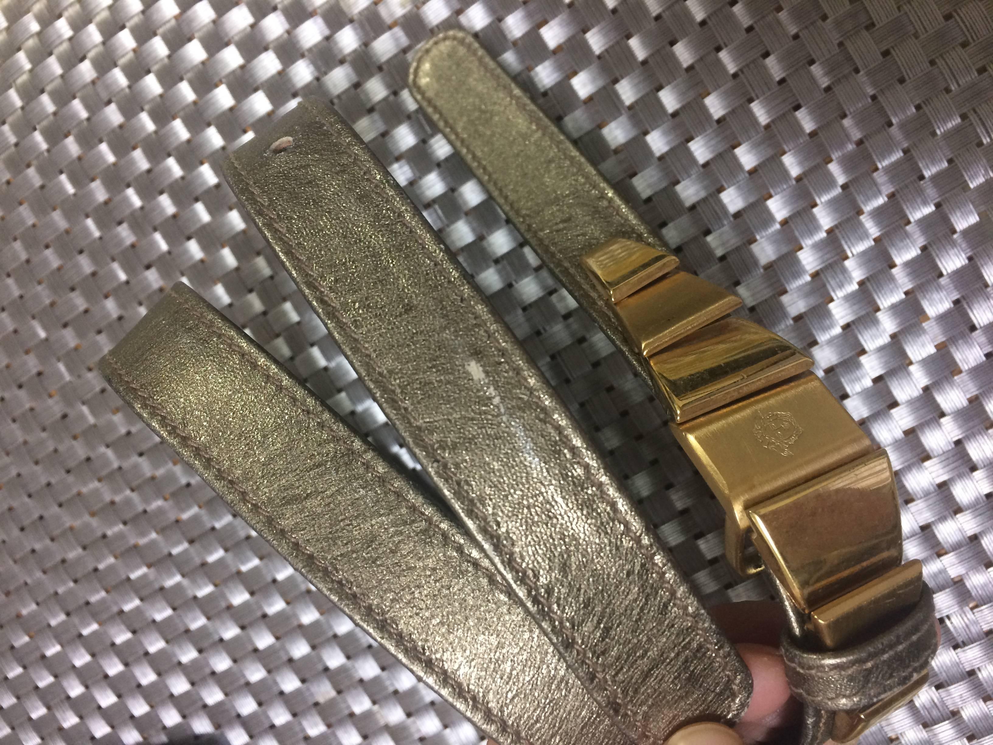 Vintage Gianni Versace skinny gold bronze leather belt with golden hardware  For Sale 1