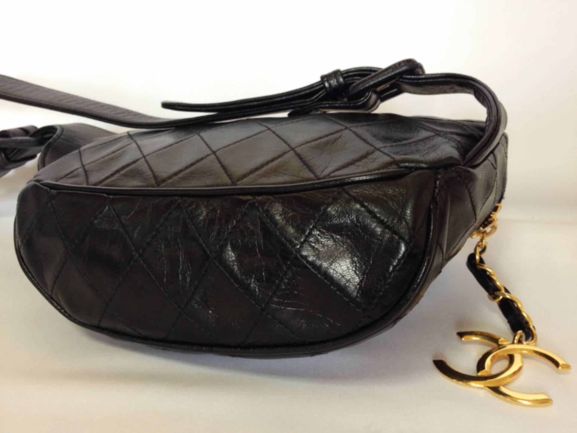 1980s Vintage CHANEL black leather waist bag, fanny pack with a detachable belt  1