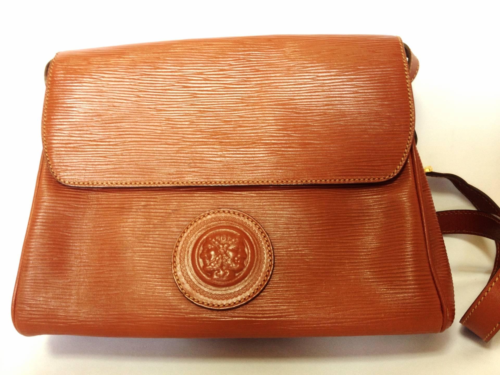 Vintage FENDI brown epi leather messenger bag, shoulder purse with iconic logo embossed motif at front. Unisex. Rare bag.

If you are a FENDI vintage collector and lover, then this one will be your must-have piece.

This is a vintage
