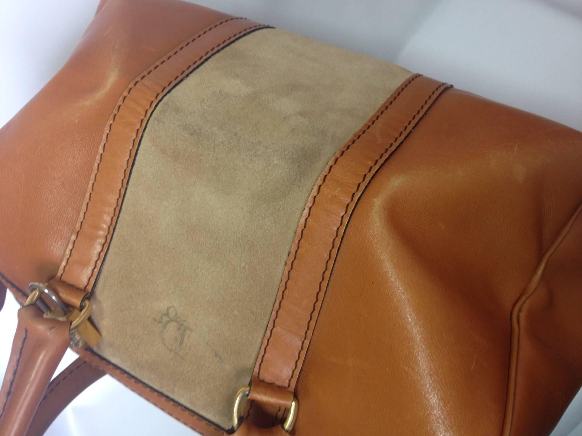 1970s Christian Dior Bagages camel brown mini duffle purse. Unisex bag 1