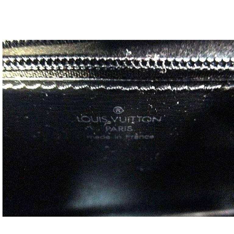 Gray Vintage Louis Vuitton black epi mod clutch, shoulder bag with a red eye hublot. For Sale
