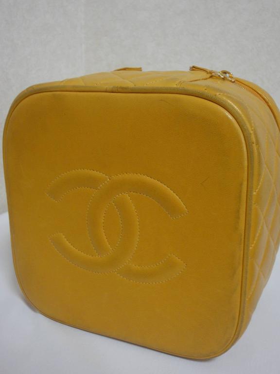 Vintage CHANEL yellow quilted lambskin cosmetic, make up case, mini