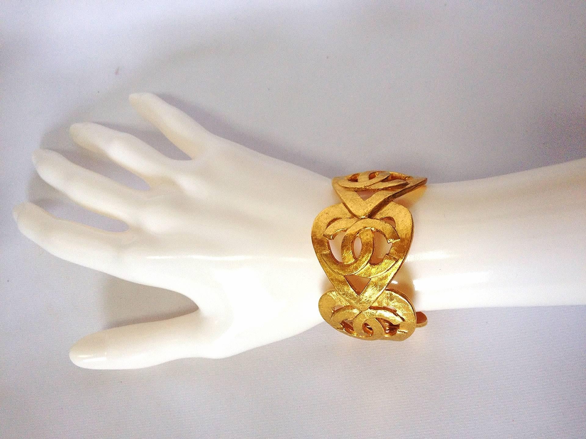 1995 Vintage CHANEL rare heart shape with CC mark rayred design bangle, bracelet. One of a kind jewelry piece.

Introducing another rare vintage jewelry masterpiece from CHANEL back in the 90's. 
Stamped 95.
If you are a vintage CHANEL lover or