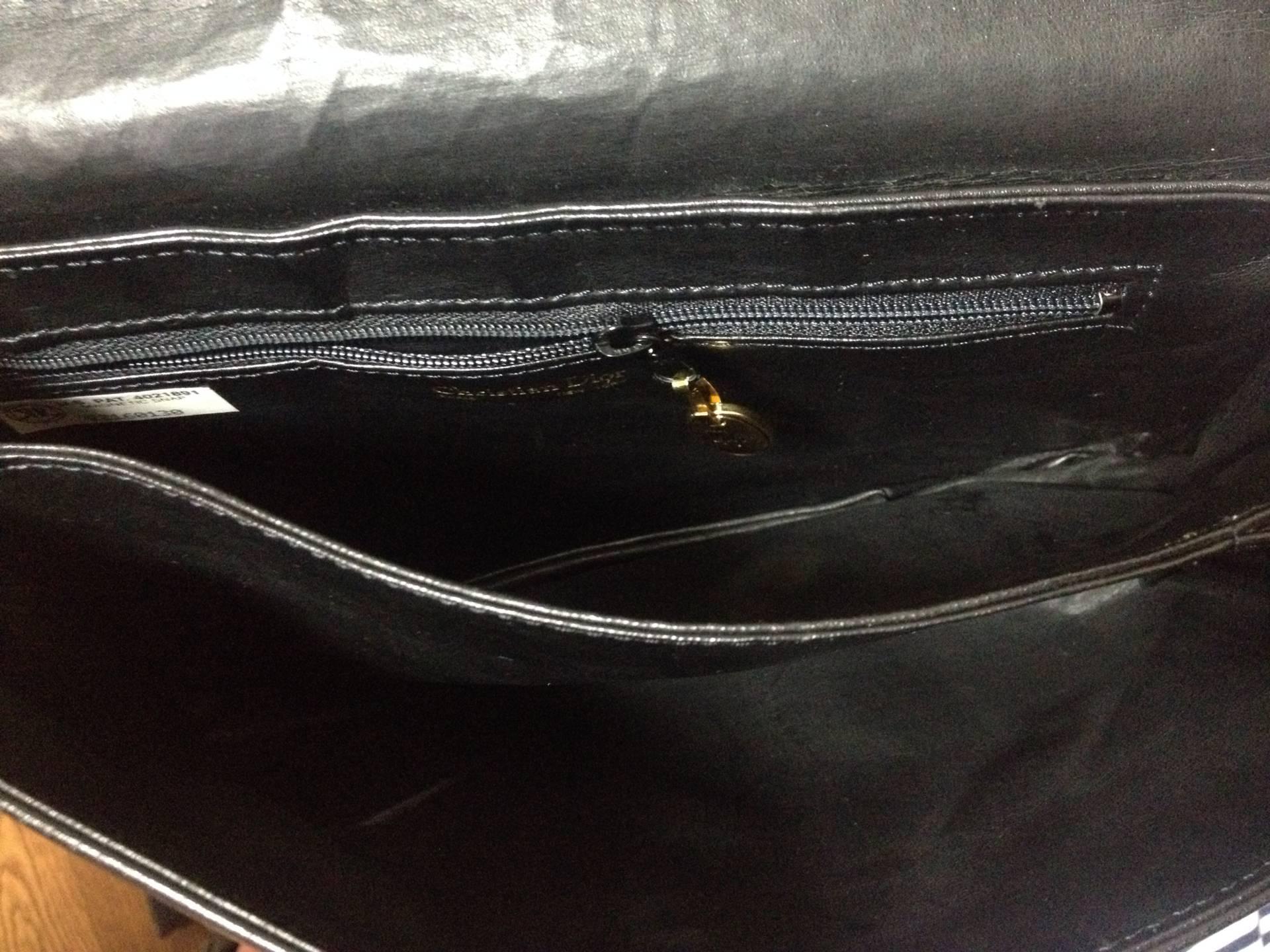 Vintage Christian Dior Vintage black leather clutch purse, mini bag, with chain. 1