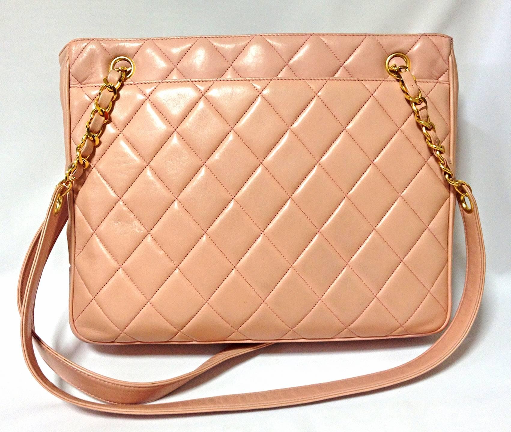 Vintage CHANEL milky pink lambskin shoulder tote bag with gold tone chain straps and CC ball charm. Classic purse.

Rare milky pink color! So spring and summer!
If you are a vintage CHANEL collector or lover, then this will be a must-have piece