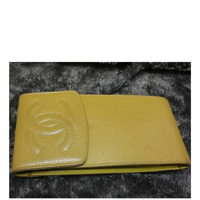Vintage CHANEL mustard yellow caviar leather mobile phone case, sunglass, cigarettes, pen pouch case with CC mark. Gift for unisex

This is a CHANEL vintage mini pouch case in mustard yellow color caviar leather from the 90s.
So chic and cute with