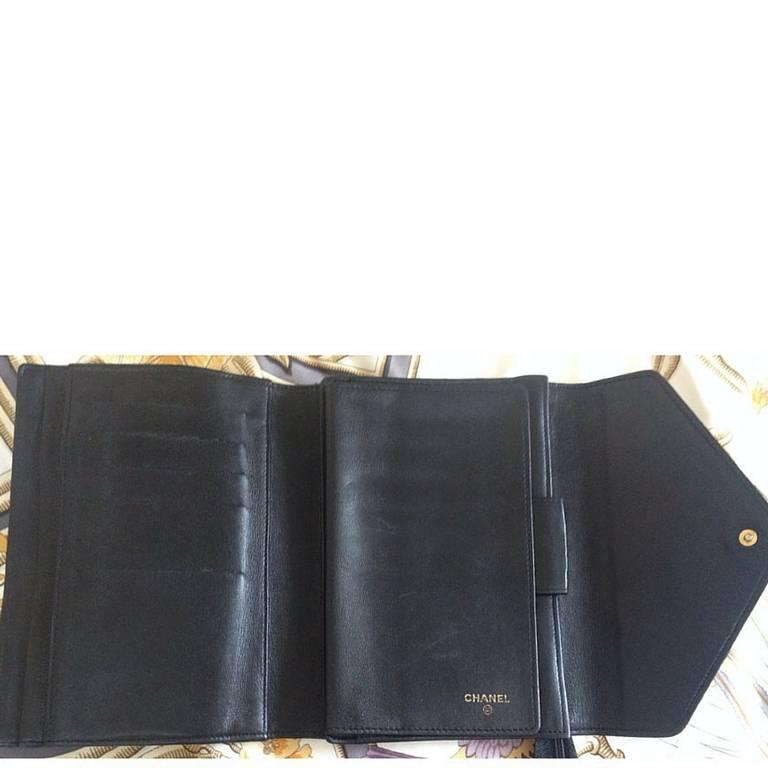 Vintage CHANEL goatskin black wallet, bill, card, checkbook, and passport case 1