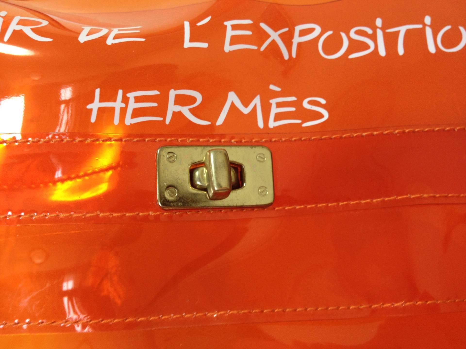 MINT condition. Hermes a rare transparent Vintage orange vinyl Kelly bag 1