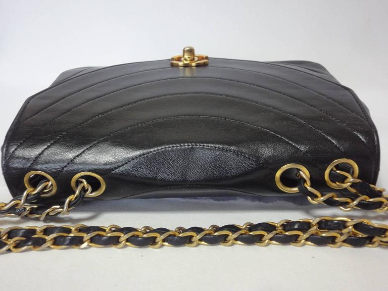80's Vintage CHANEL wave oval U stitch black lamb leather classic 2.55 flap  bag at 1stDibs