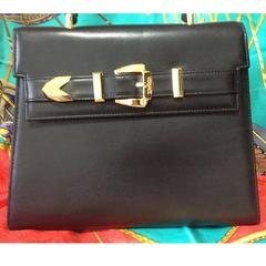 Vintage Gianni Versace black leather Kelly style bag with golden buckle closure