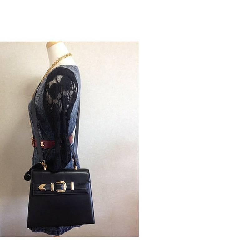 Vintage Gianni Versace black leather Kelly style bag with golden buckle closure  For Sale 2