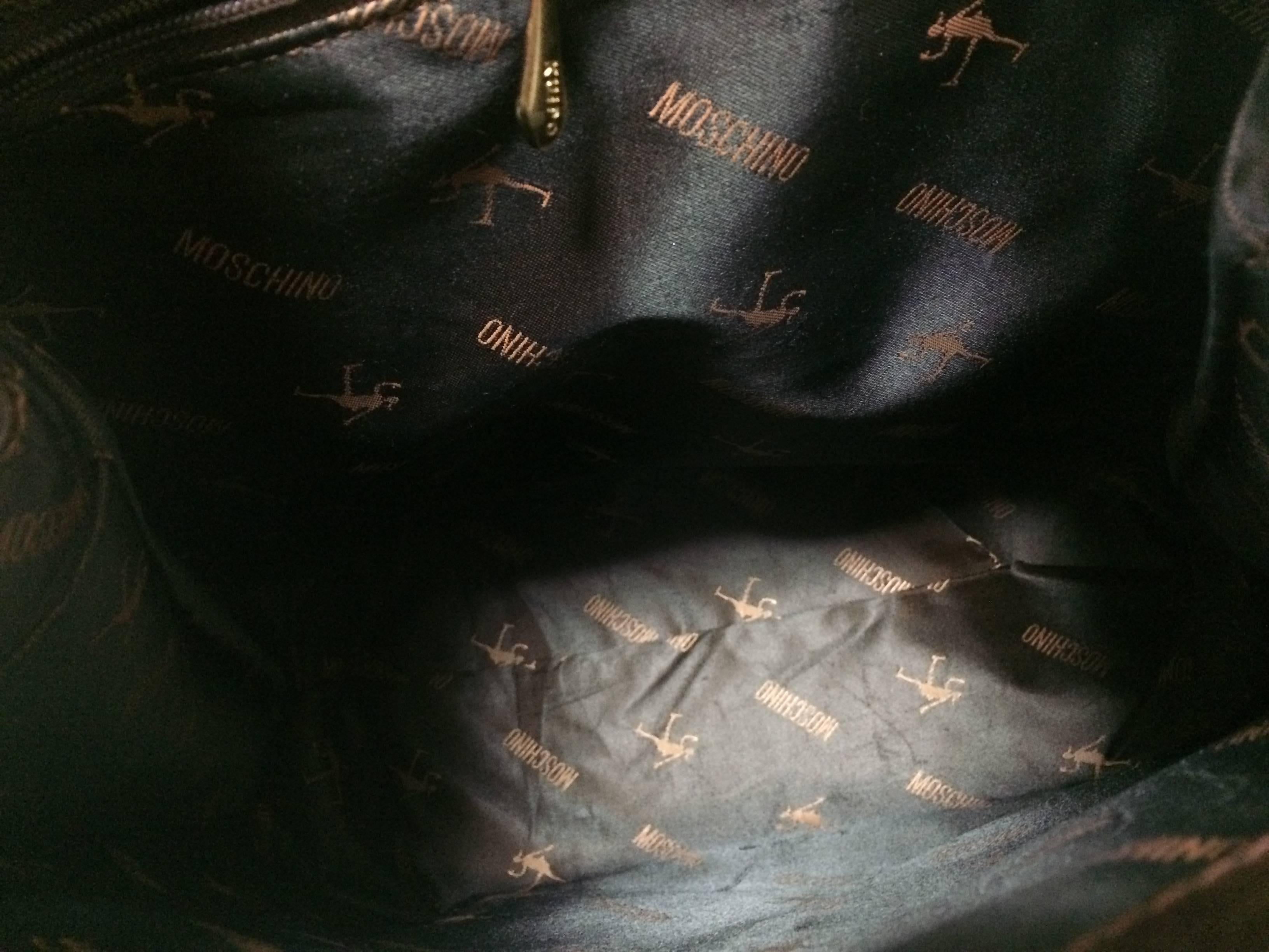 Vintage MOSCHINO dark brown leather backpack with golden and black M logo. For Sale 3