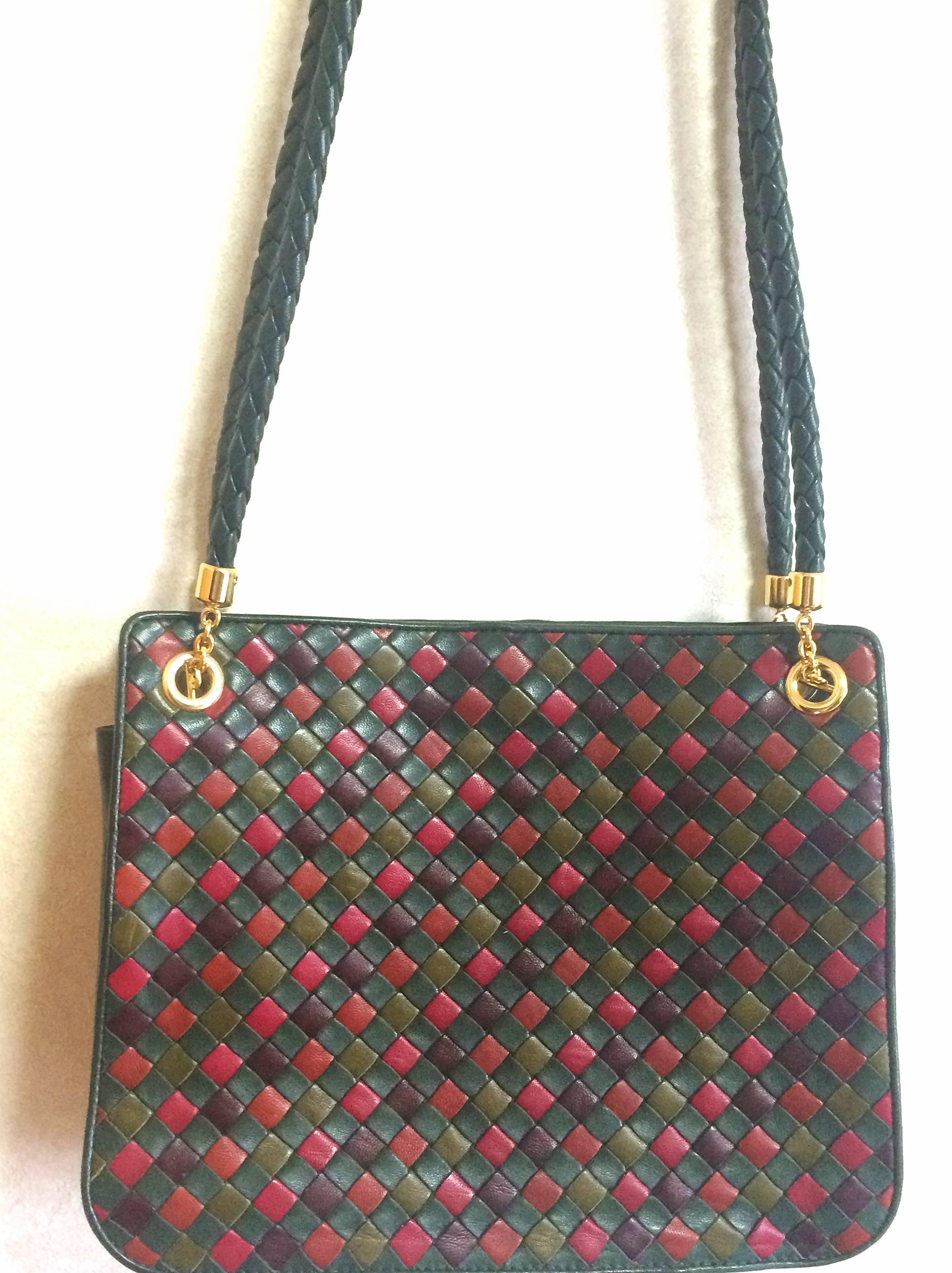 Vintage Bottega Veneta intrecciato woven lambskin shoulder tote bag in red, wine, orange, green, and khaki. Multicolor rare purse.

If you are looking for a rare and unique vintage Bottega Veneta's intrecciato, then this is definitely a must-have