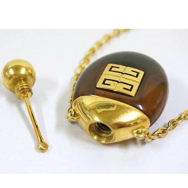 Women's Vintage Givenchy gold chain perfume bottle necklace with brown marble stone For Sale