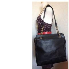 Vintage CHANEL black caviar leather shoulder tote bag with cc stitch marks.