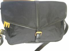 MINT. Vintage Moschino black nylon saumur messenger shoulder bag with leather