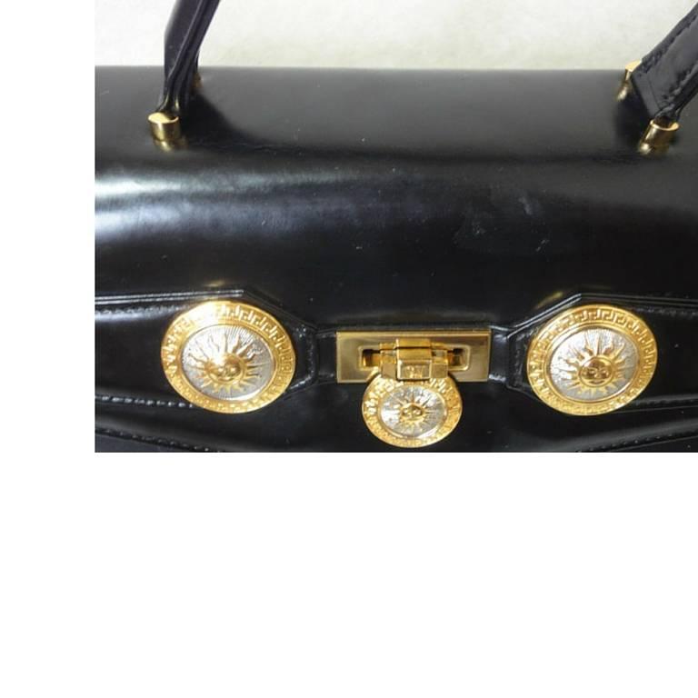 Vintage Gianni Versace genuine black leather Kelly style bag with Sunburst motif In Good Condition In Kashiwa, Chiba