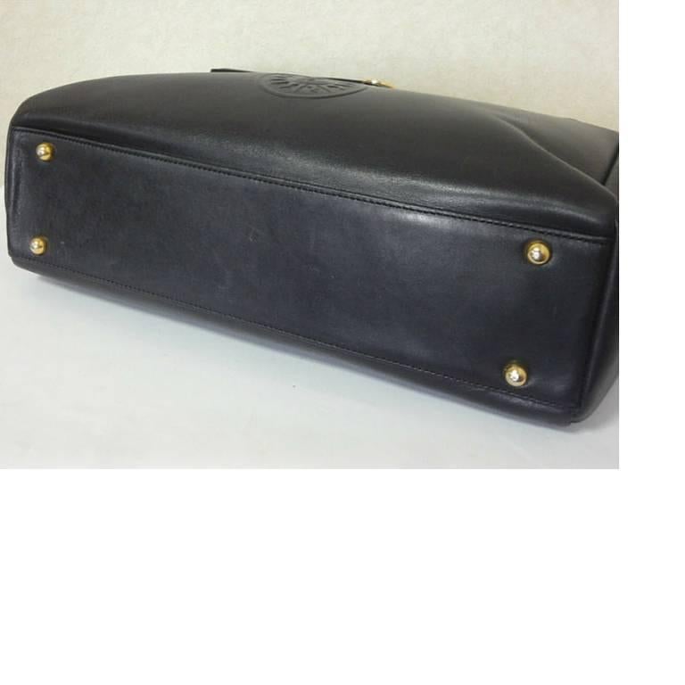 Vintage Gianni Versace genuine black leather Kelly style bag with Sunburst motif 4