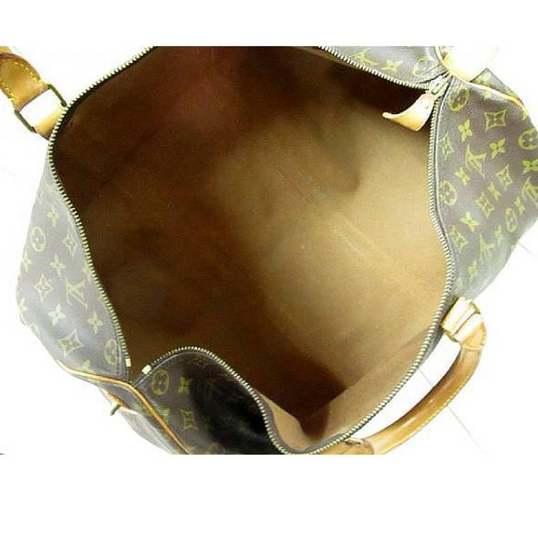 Vintage Louis Vuitton monogram travel keepall 50 duffle bag. Bandouliere purse.  1