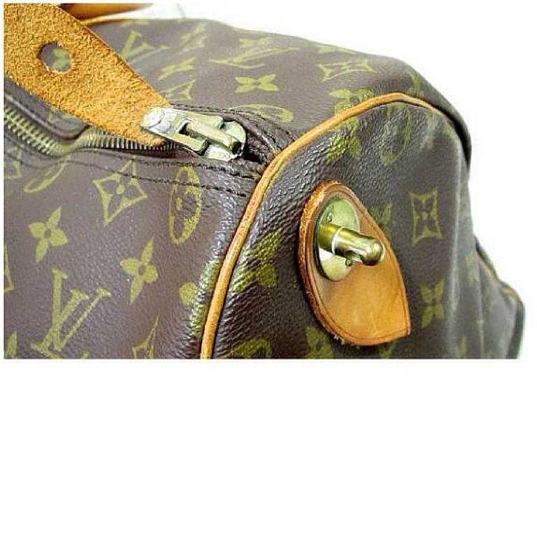 Women's or Men's Vintage Louis Vuitton monogram travel keepall 50 duffle bag. Bandouliere purse. 