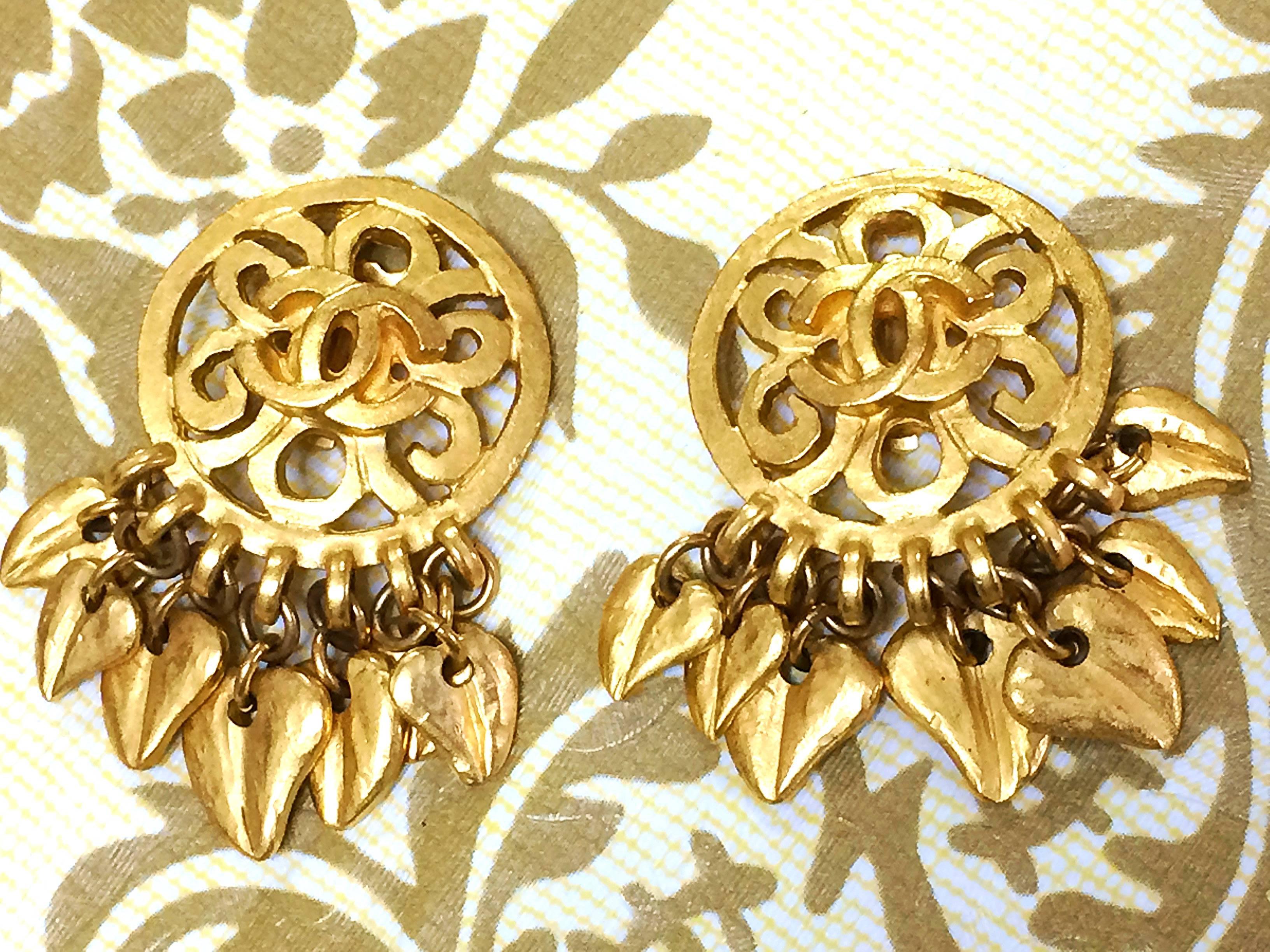 Art Deco Vintage CHANEL round arabesque CC design golden earrings with dangling mini leaf