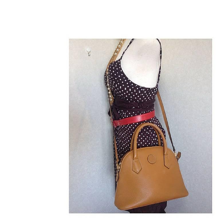 Orange Vintage FENDI tanned brown leather bolide style bag with shoulder strap. For Sale