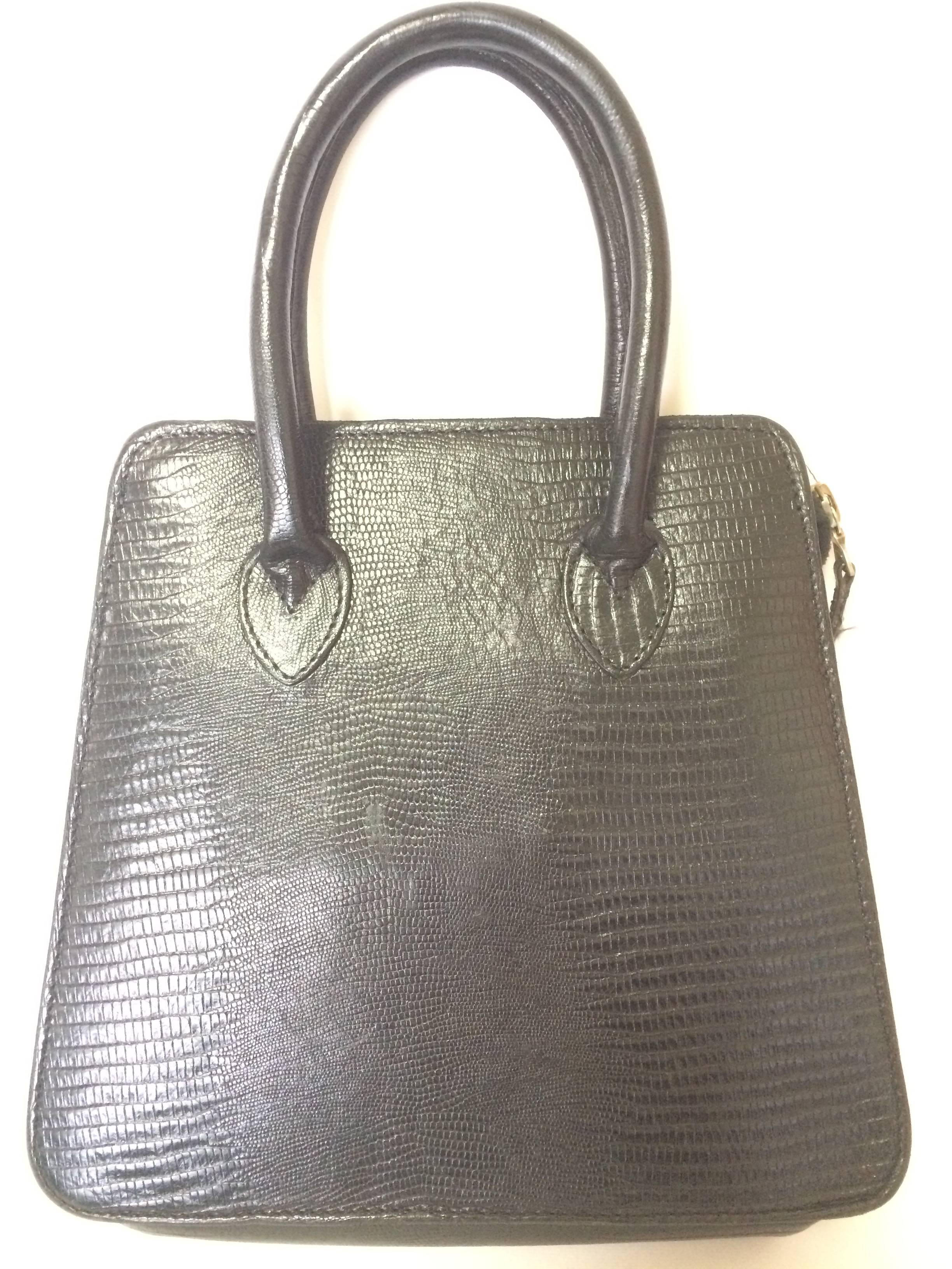 1990s. Vintage Mulberry lizard embossed black leather trapezoid shape mini tote bag. Masterpiece back in the era. Roger Saul era.

This is one old sophisticated masterpiece from Mulberry in the early 90s, Roger Saul era. 
Mini trapezoid shape