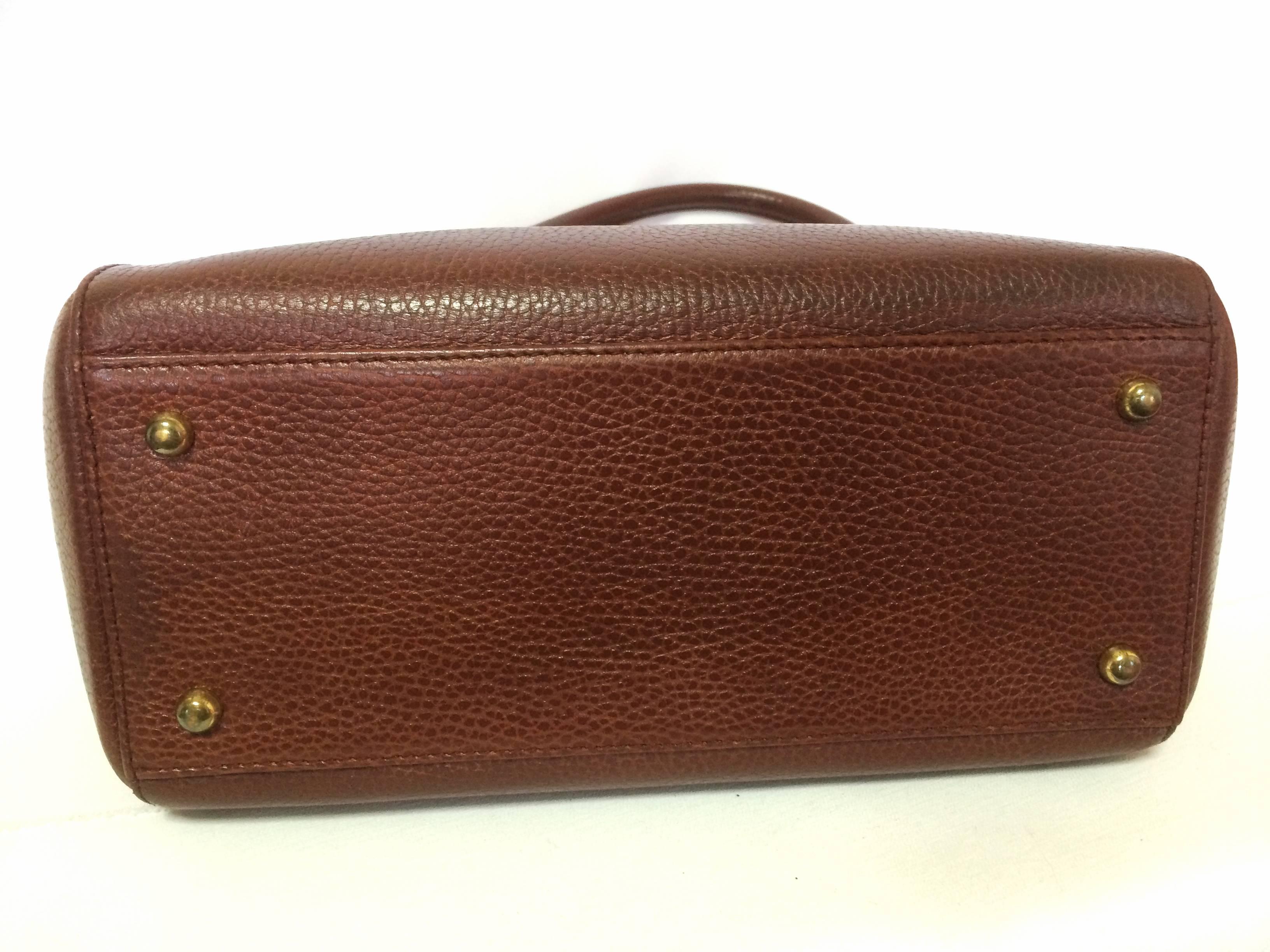 Women's Vintage Cartier classic brown leather handbag with logo.  les must de Cartier