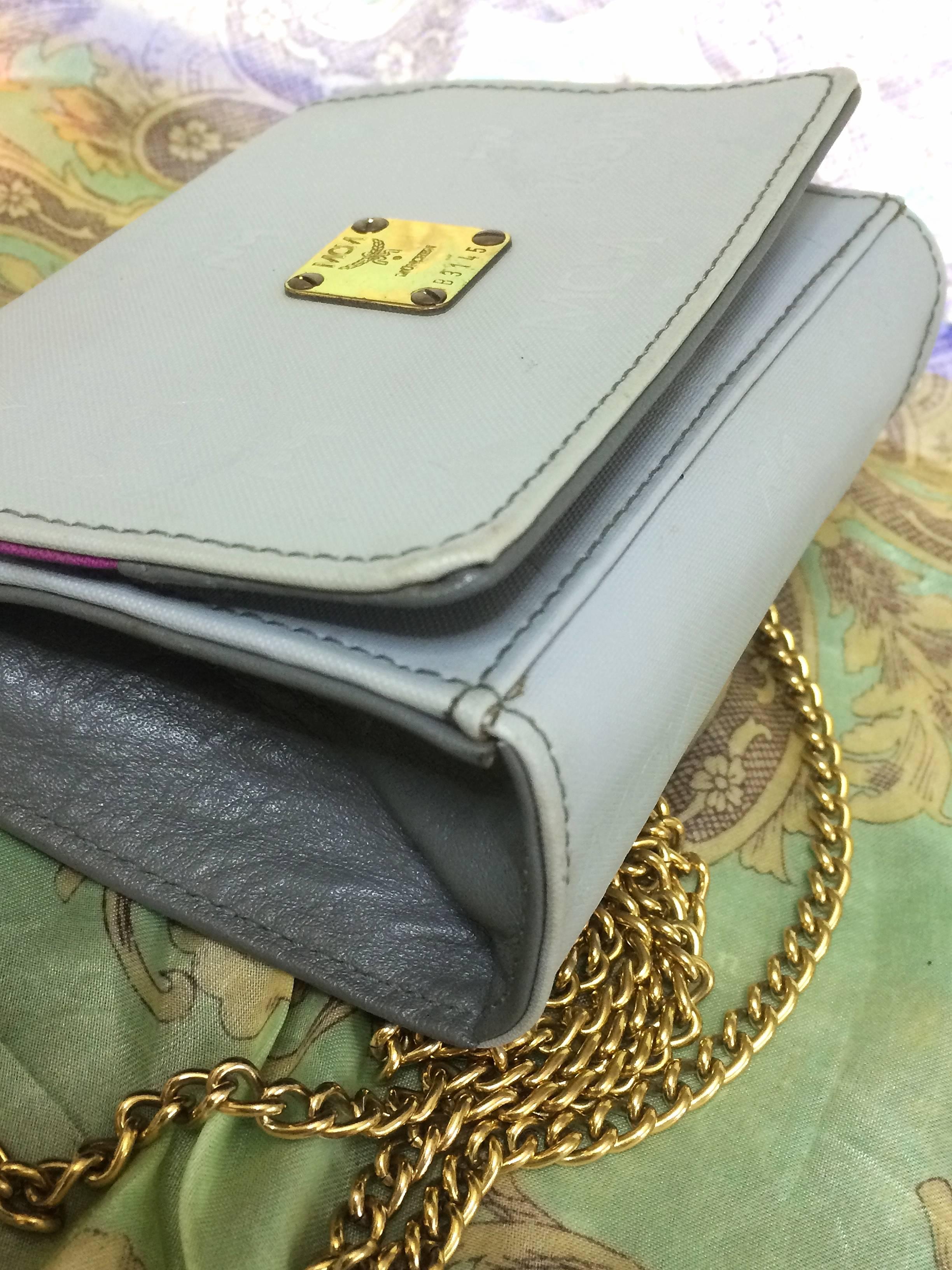Vintage MCM light grey monogram and purple interior mini clutch shoulder bag. For Sale 1