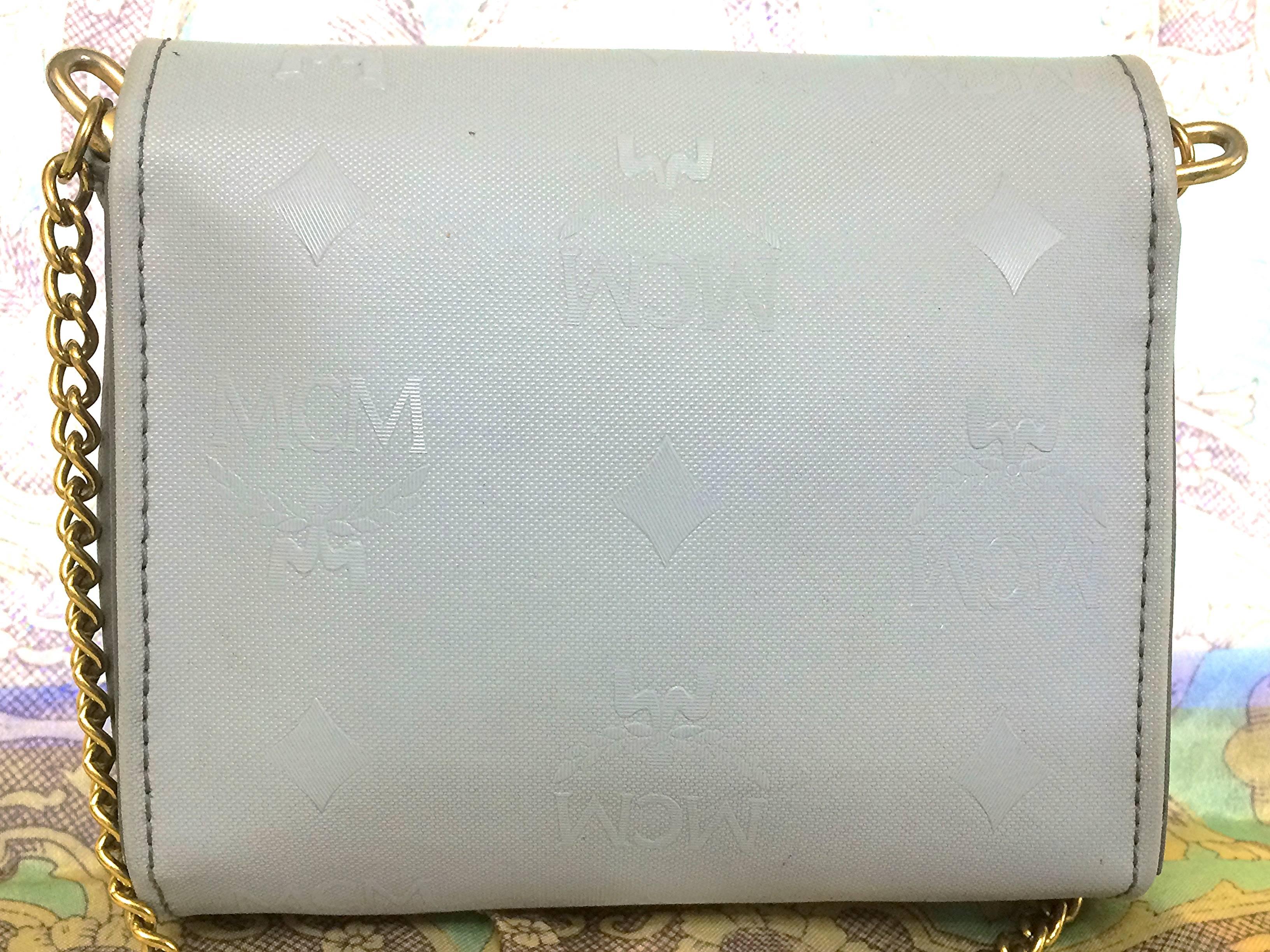 Gray Vintage MCM light grey monogram and purple interior mini clutch shoulder bag. For Sale