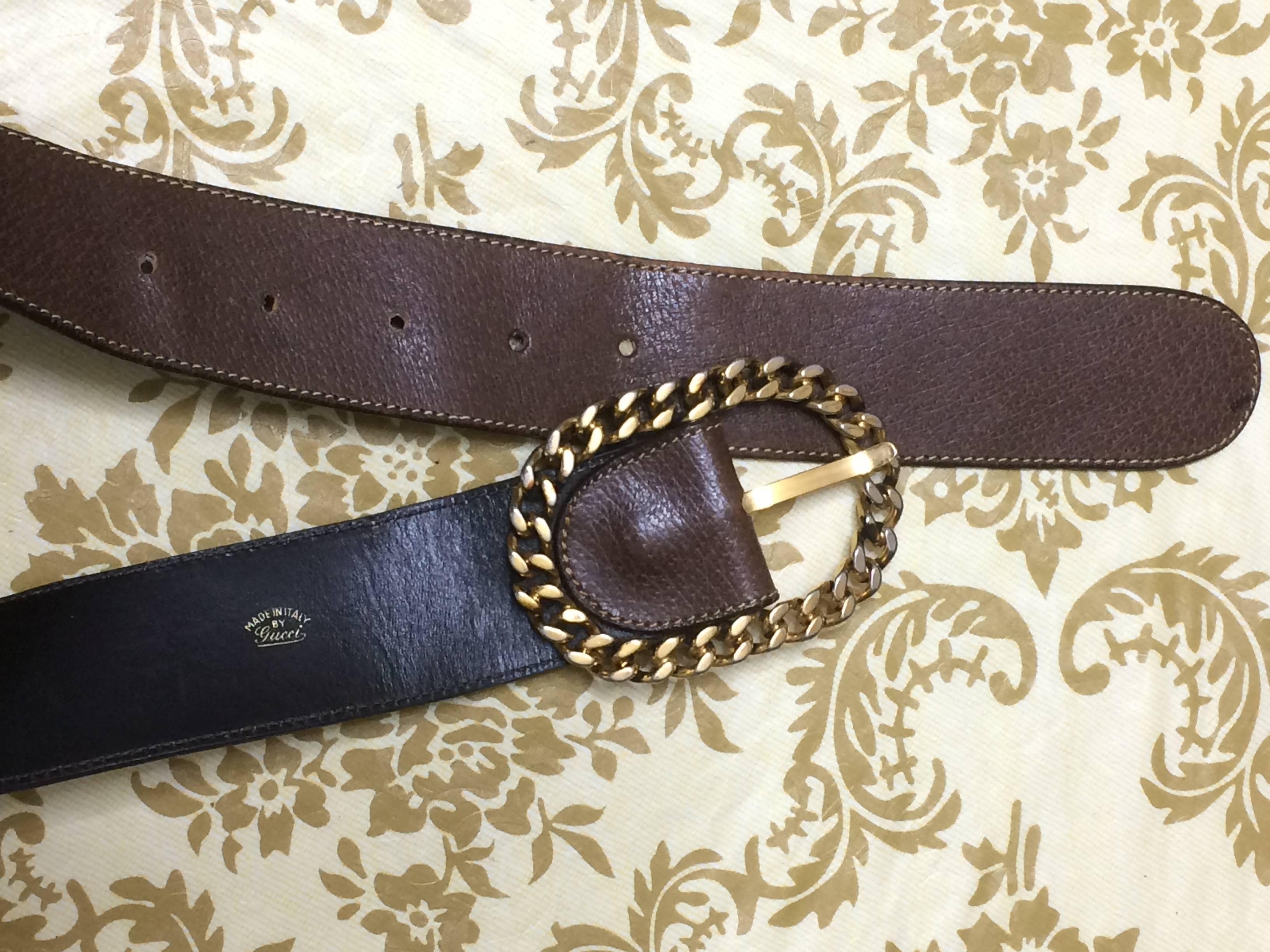 Women's or Men's Vintage Gucci dark brown leather belt with detachable golden chain buckle.  For Sale