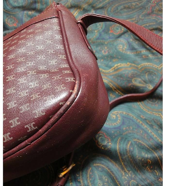 Black 80's vintage Celine shoulder purse in bordeaux, burgundy leather with blason. For Sale