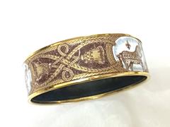 Vintage Hermes cloisonne enamel horse and tassel, fringe design bangle. Bracelet