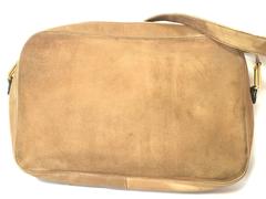 Vintage Christian Dior brown beige suede shoulder bag with golden CD motif.