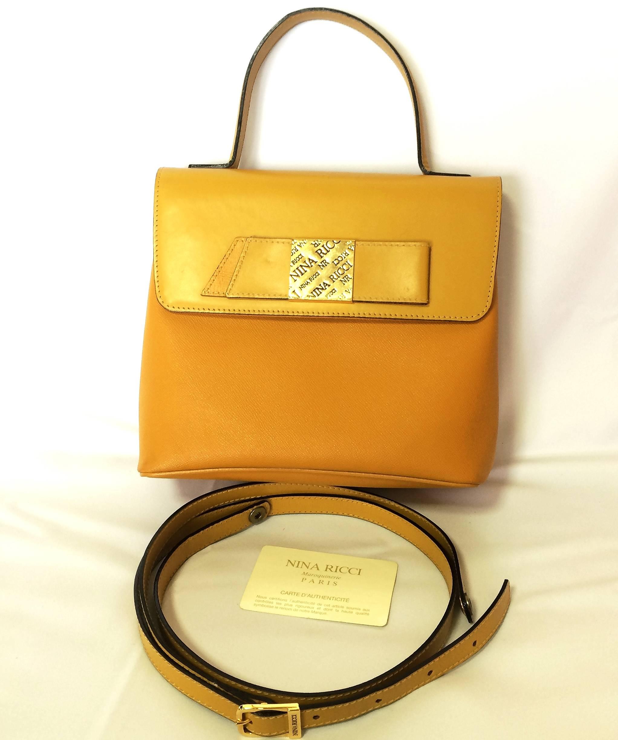 MINT. Vintage Nina Ricci yellow leather handbag purse with shoulder strap. 2