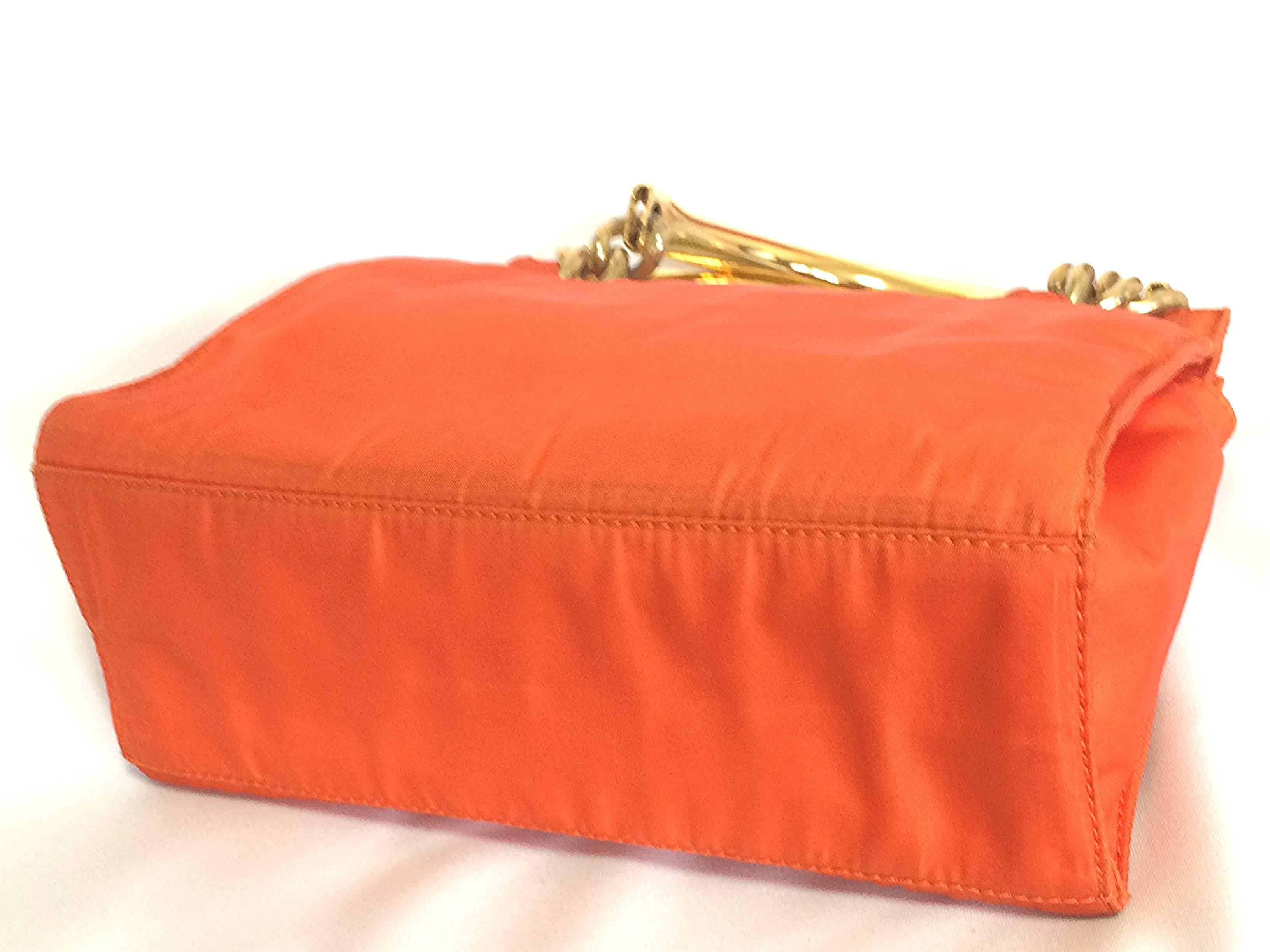 orange metallic bag