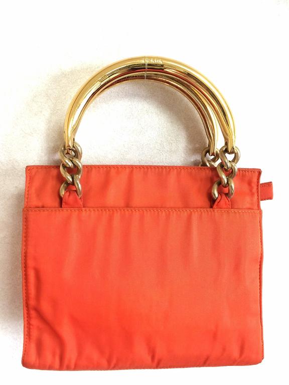 Vintage PRADA orange nylon mini tote bag with golden chain and