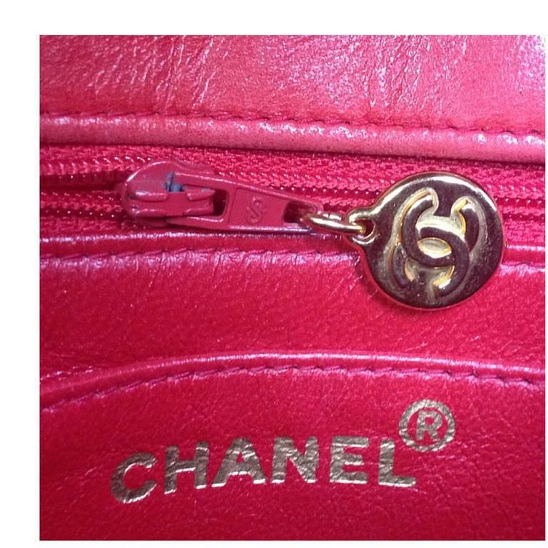 Women's Vintage CHANEL lipstick red lamb leather shoulder bag with leather strap and cc.