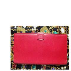 Vintage Christian Dior red genuine leather wallet with gold tone CD charm.