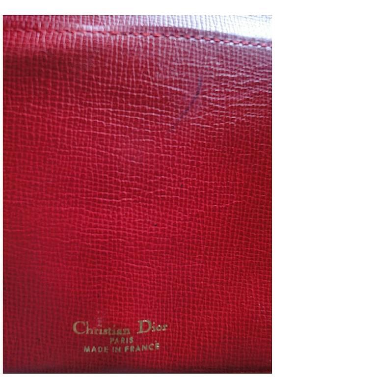 Vintage Christian Dior red genuine leather wallet with gold tone CD charm. For Sale 1