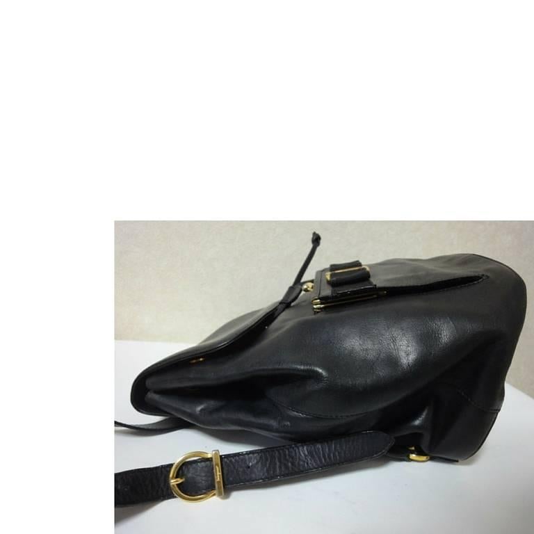 Vintage Salvatore Ferragamo black calf leather backpack from vara collection. 2