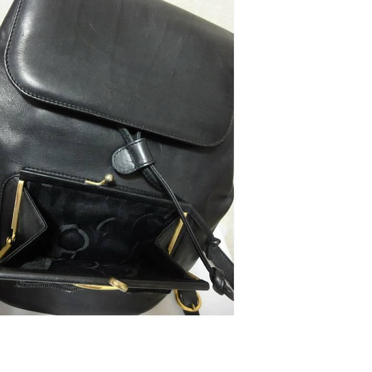 Women's Vintage Salvatore Ferragamo black calf leather backpack from vara collection.